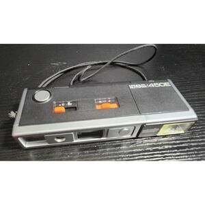 Minolta Autopak Film Camera 450E Black‎ Pocket Built In Flash Untested Powers On